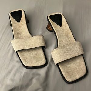 Designer sandals. Hard to find style using canvas uppers and wood heel.